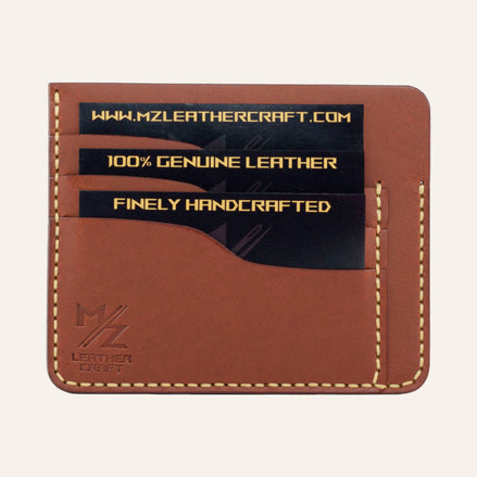 MZ Leather Craft kiremit Buttero deri ters cüzdan, kartlarla dolu düz ön görünüm, 3 ön kart yuvası, sarı el dikişleri ve kabartmalı MZ logosu | The Inverse Wallet - Chestnut Buttero Leather by MZ Leather Craft, flat front view filled with cards, featuring 3 front card slots, yellow hand-stitching, and embossed MZ logo