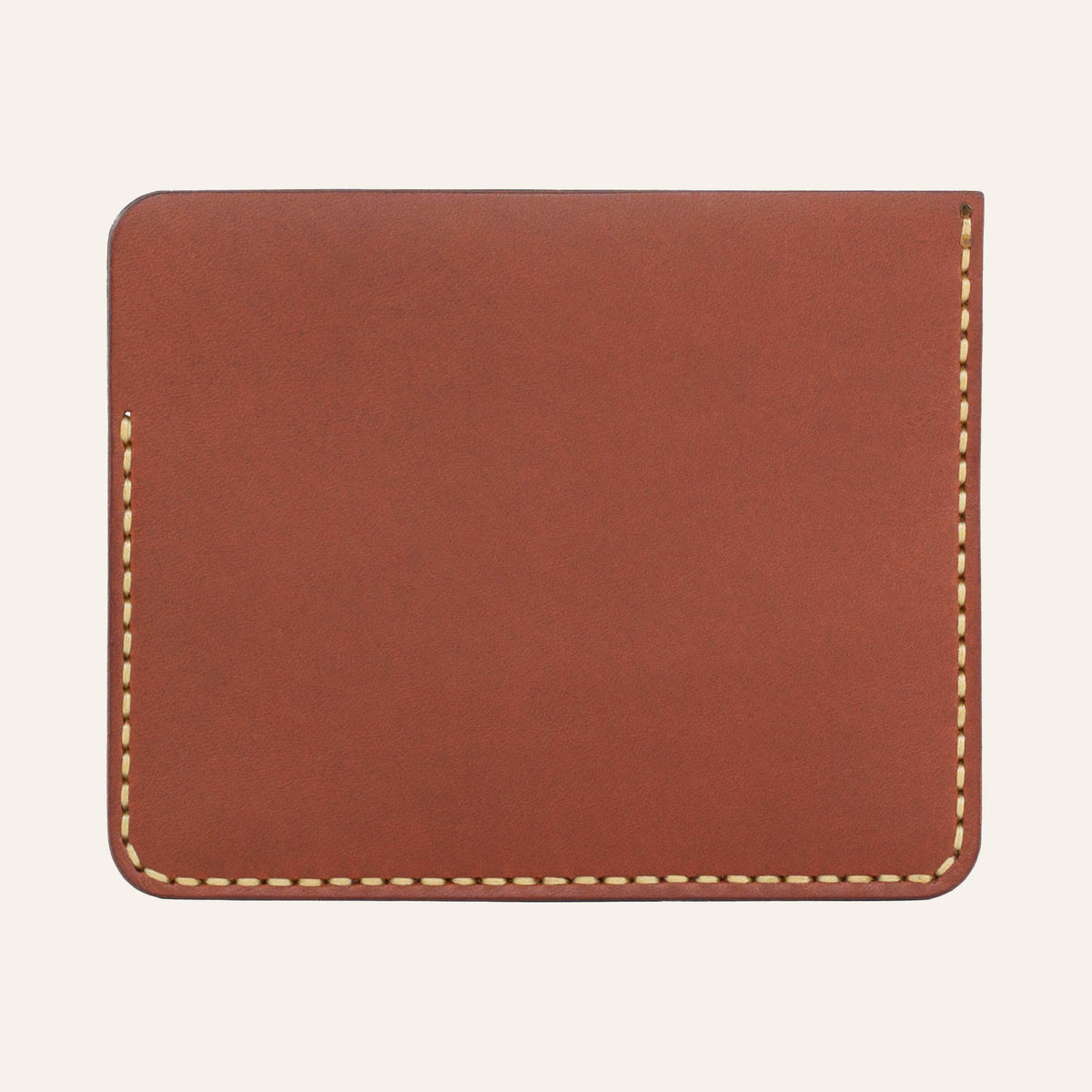 MZ Leather Craft kiremit Buttero deri ters cüzdan, kesintisiz düz deri paneli ve çevreleyen sarı el dikişlerini gösteren arka görünüm | The Inverse Wallet - Chestnut Buttero Leather by MZ Leather Craft, flat back view showcasing the seamless leather panel and surrounding yellow hand-stitching