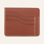 MZ Leather Craft kiremit Buttero deri ters cüzdan, 3 boş kart yuvasını ve mat deri dokusunu gösteren düz ön görünüm, sarı el dikişleri ve kabartmalı MZ logosu | The Inverse Wallet - Chestnut Buttero Leather by MZ Leather Craft, flat front view showing 3 empty card slots and matte leather texture, with yellow hand-stitching and embossed MZ logo