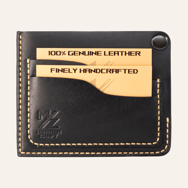 MZ Leather Craft köşe çıtçıtlı ters cüzdan siyah Buttero deri, kapalı önden görünüm, iki adet dolu kart yuvası, sarı el dikişi ve kabartmalı MZ logosu | The Inverse Wallet | Corner Snap Edition - Black Buttero Leather by MZ Leather Craft, closed front view with two filled card slots, yellow hand-stitching, and embossed MZ logo