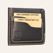 MZ Leather Craft köşe çıtçıtlı ters cüzdan siyah Buttero deri, kapalı hafif açılı sol profil görünümü, dolu kart yuvaları, sarı el dikişi ve pürüzsüz deri dokusu | The Inverse Wallet | Corner Snap Edition - Black Buttero Leather by MZ Leather Craft, closed slightly angled left profile view showing filled card slots, yellow saddle stitching, and smooth leather texture