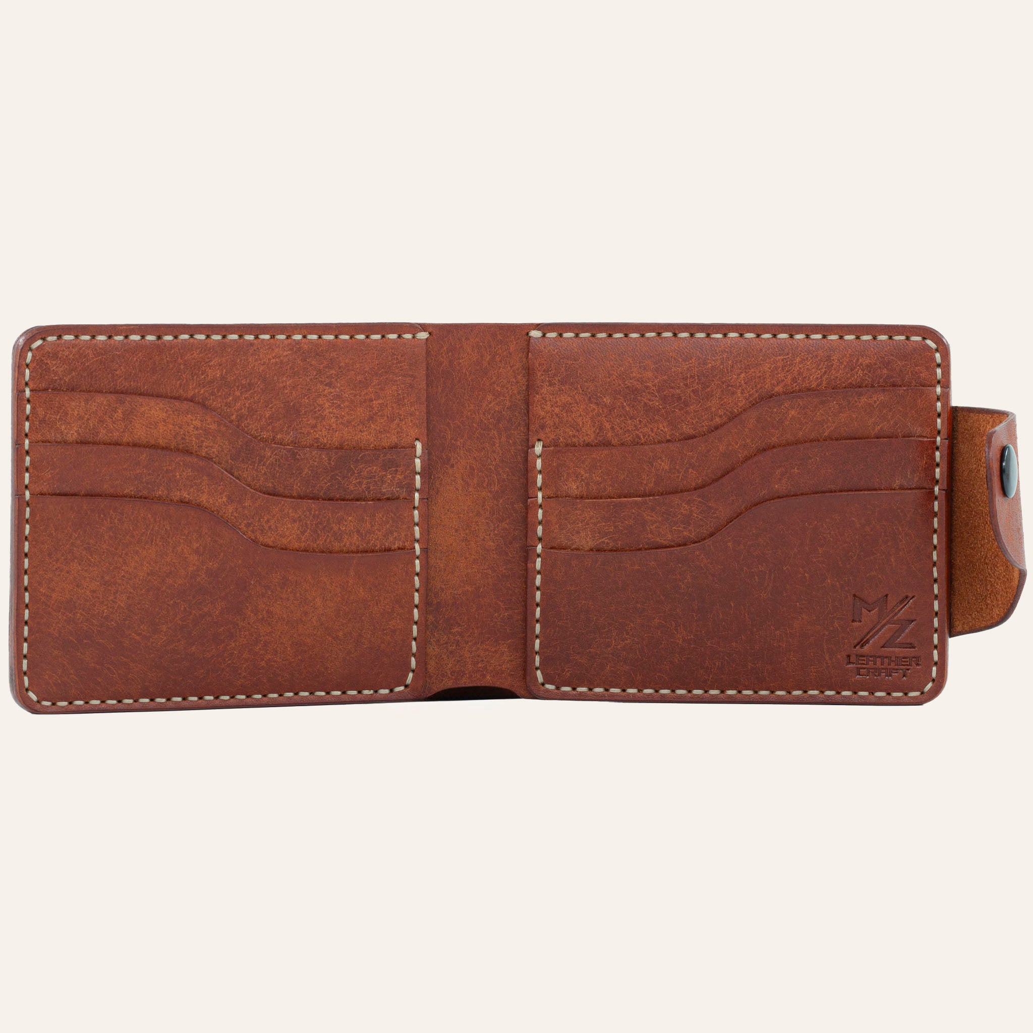 MZ Leather Craft açık kiremit Pueblo deri klasik cüzdan boş iç görünüm, altı kıvrımlı kart yuvası ve açık gri saraç dikiş takviyeleri ile | MZ Leather Craft open siena Pueblo leather classic bifold wallet empty interior view, showing six curved card slots and light gray saddle stitching details
