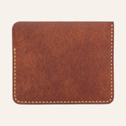 MZ Leather Craft kiremit Pueblo deri ters cüzdan, kesintisiz düz deri paneli ve çevreleyen sarı el dikişlerini gösteren arka görünüm | The Inverse Wallet - Siena Pueblo Leather by MZ Leather Craft, flat back view showcasing the seamless leather panel and surrounding yellow hand-stitching