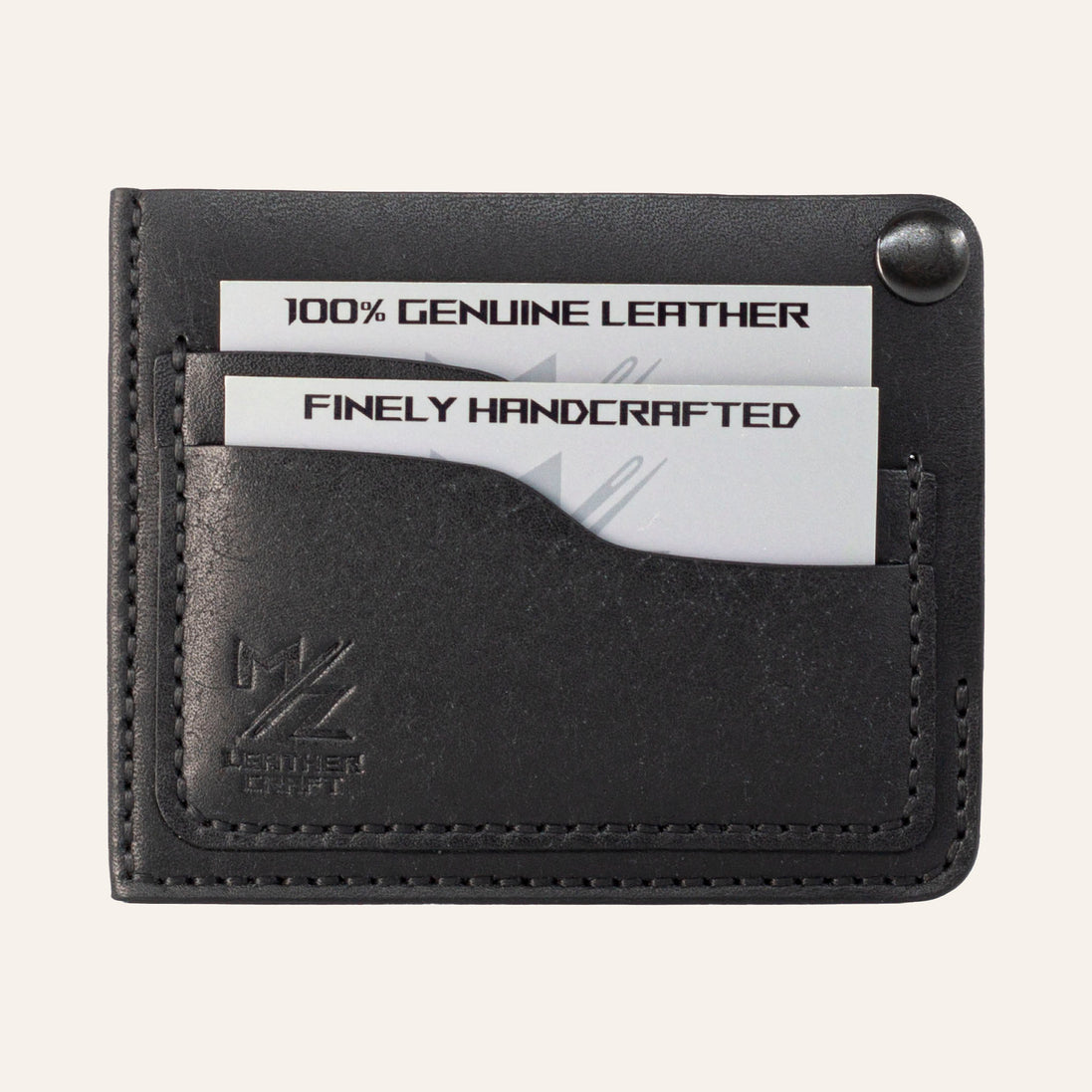 MZ Leather Craft köşe çıtçıtlı ters cüzdan siyah Pueblo deri, kapalı önden görünüm, iki adet dolu kart yuvası, siyah el dikişi ve kabartmalı MZ logosu | The Inverse Wallet | Corner Snap Edition - Black Pueblo Leather by MZ Leather Craft, closed front view with two filled card slots, black hand-stitching, and embossed MZ logo
