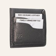 MZ Leather Craft köşe çıtçıtlı ters cüzdan siyah Pueblo deri, kapalı hafif açılı sol profil görünümü, dolu kart yuvaları ve mat deri dokusu | The Inverse Wallet | Corner Snap Edition - Black Pueblo Leather by MZ Leather Craft, closed slightly angled left profile view showing filled card slots and matte leather texture